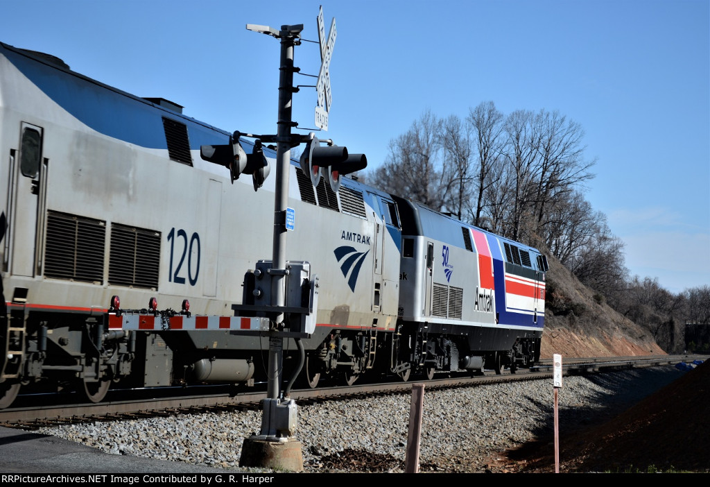 Pepsi can 160 and AMTK 120 on train 20(7) crossing Carroll Ave.  LYH station stop a mile away